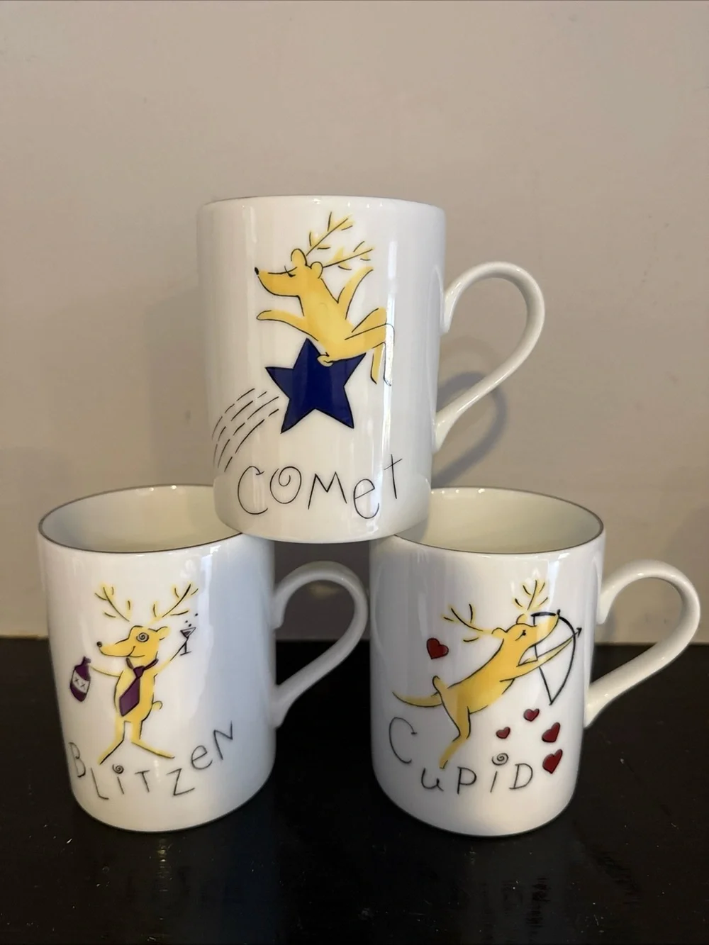 Pottery Barn White Mug Set with Yellow Reindeer Designs (Comet, Blitzen, Cupid)